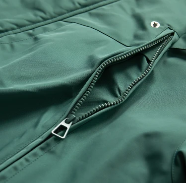 Green sherpa lined jacket pocket
